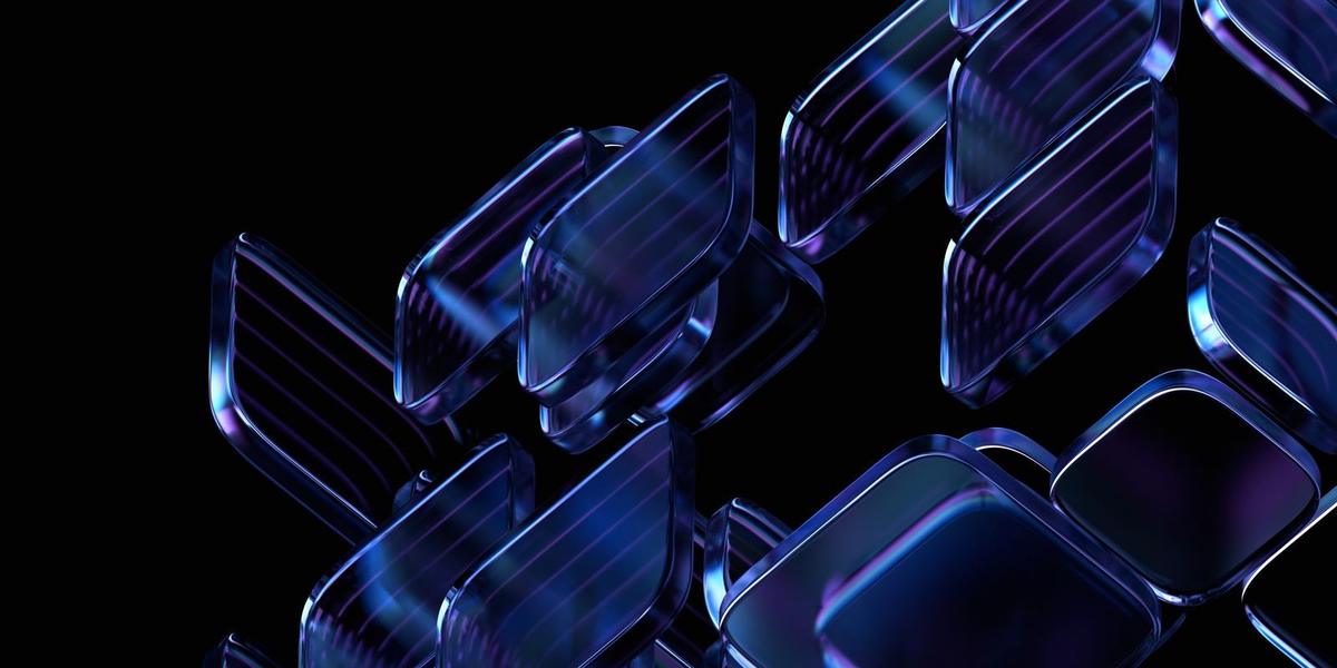 Abstract 3D shapes with a glossy blue and purple finish on a black background.