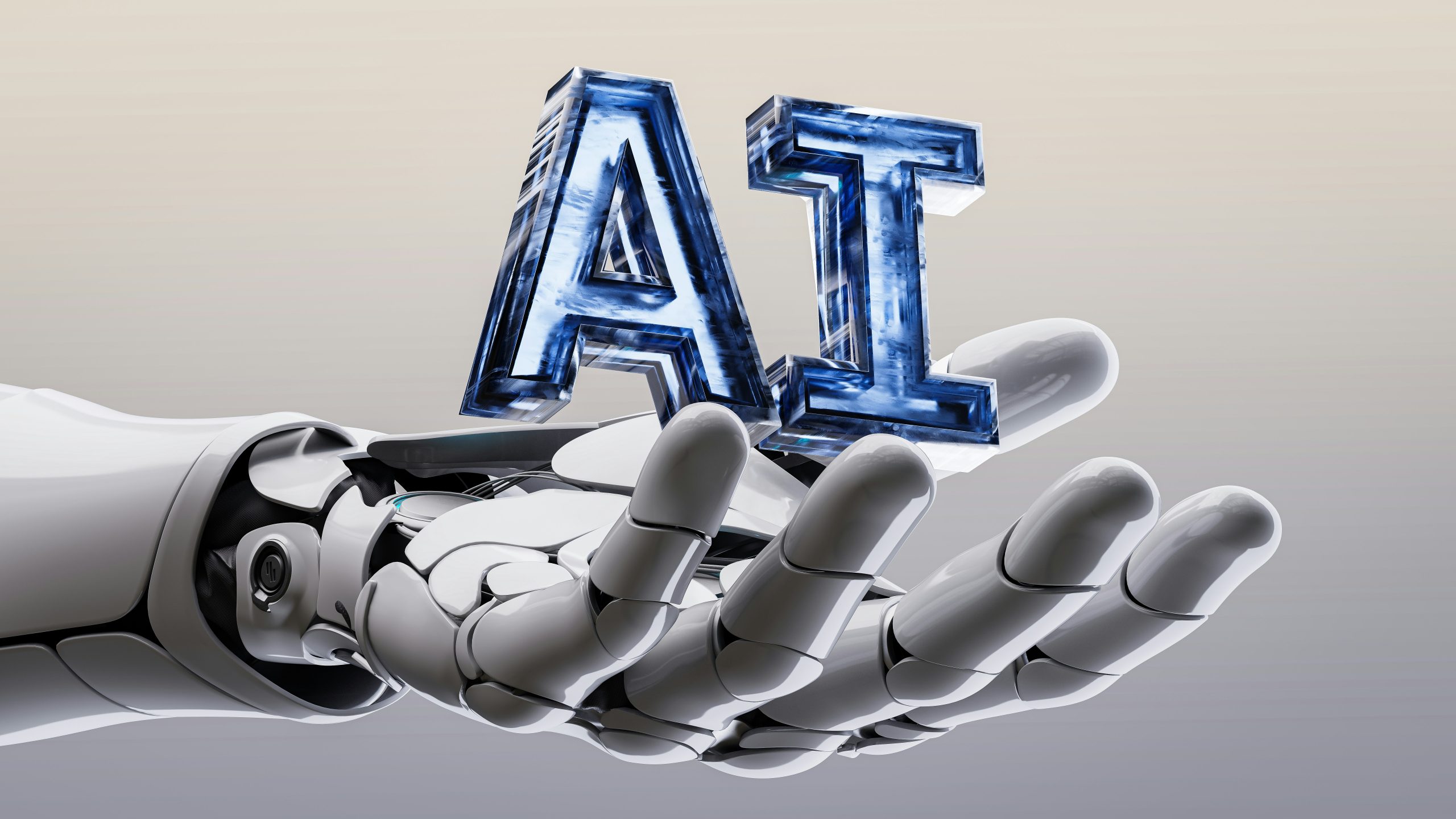 Image of a white robot hand holding the blue letters AI