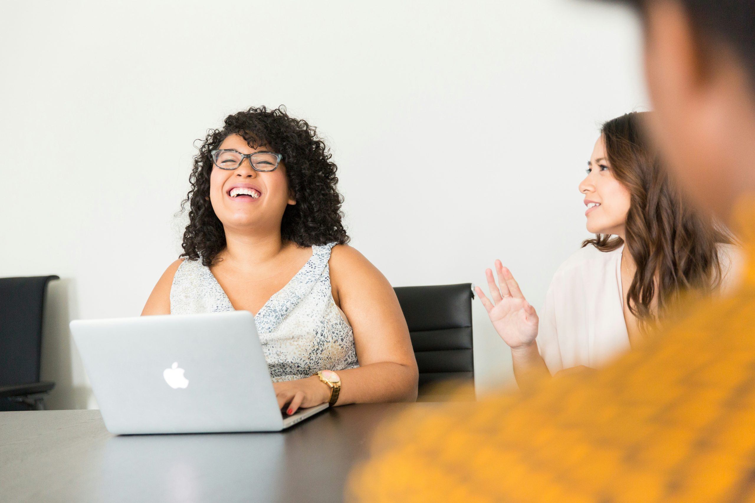 An image of Women at work succeeding in career and motherhood