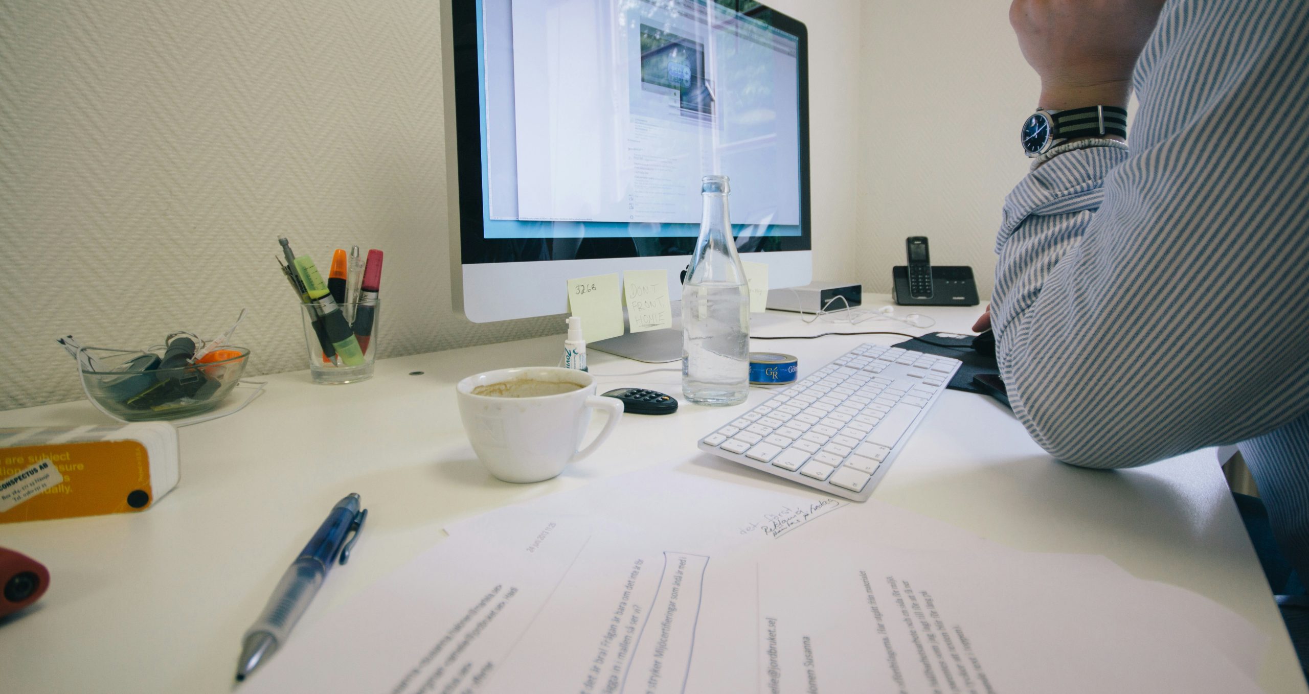 An image of a Barristers clerk working at the desk